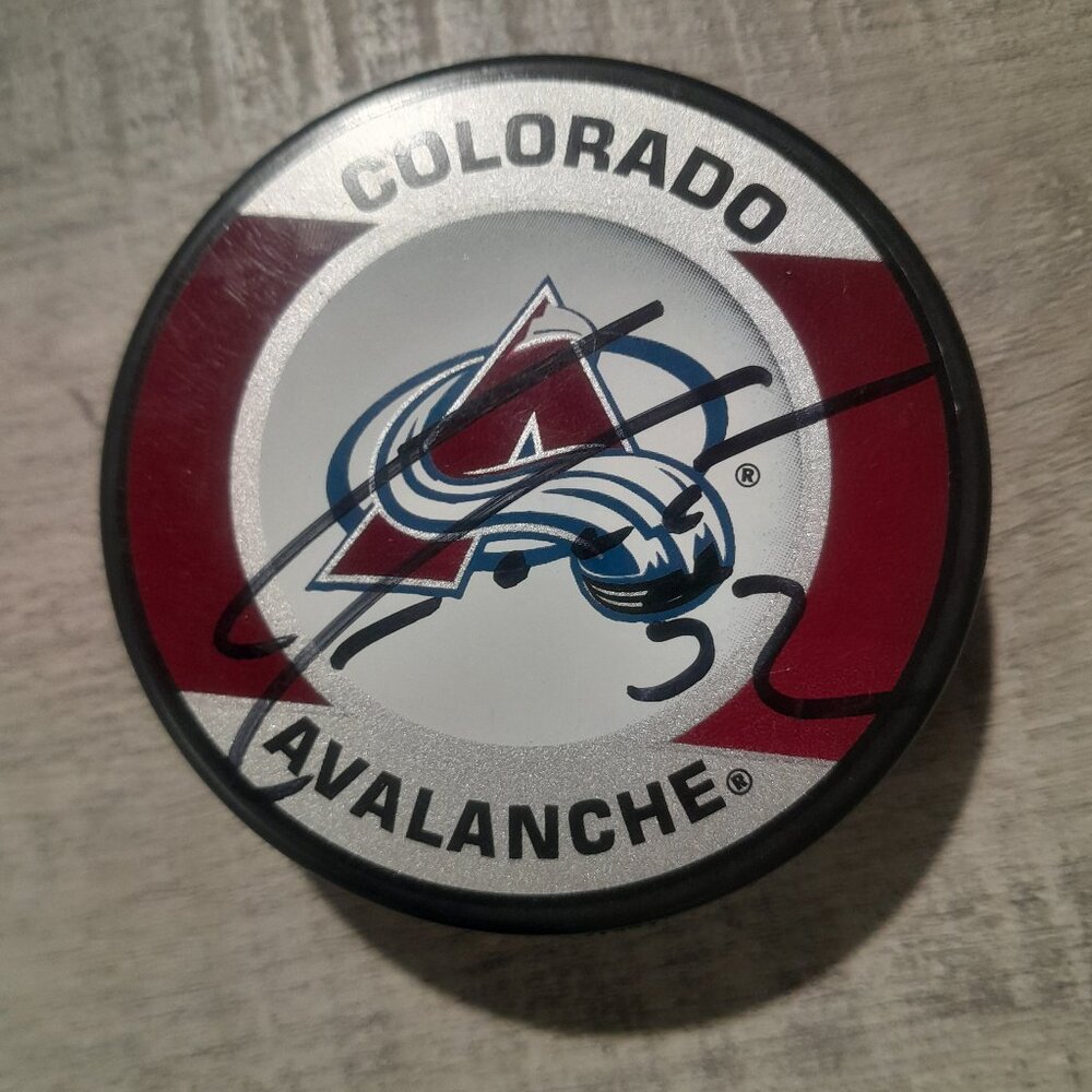 Signed Adam Foote Hockey Puck